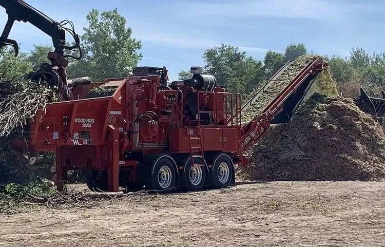 Side of New Morbark working in field